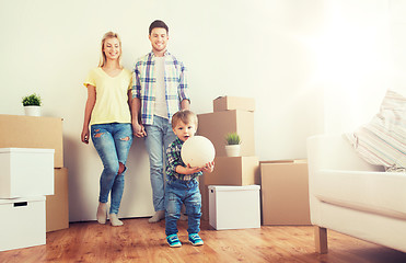 Image showing happy family moving to new home and playing ball