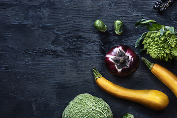 Image showing Organic vegetables on wooden table. Top view