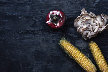 Image showing Organic vegetables on wooden table. Top view