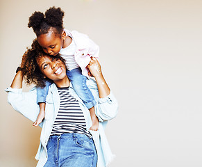 Image showing adorable sweet young afro-american mother with cute little daugh