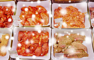 Image showing marinated meat in bowls at grocery stall