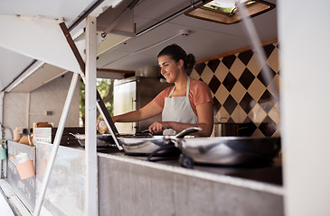 Image showing happy chef or seller cooking at food truck