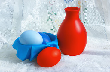 Image showing Painted Easter Eggs And A Jug On A Lace