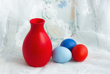 Image showing Three Easter Eggs And A Jug On A Lace