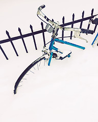 Image showing Bicycle stuck in deep snow