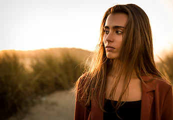 Image showing Portrait of a beautiful woman on the beach