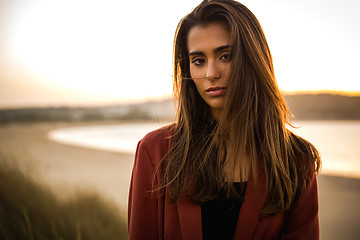 Image showing Portrait of a beautiful woman on the beach