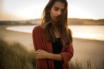 Image showing Portrait of a beautiful woman on the beach