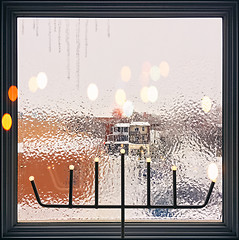 Image showing Icicles on a frosted window decorated with lights