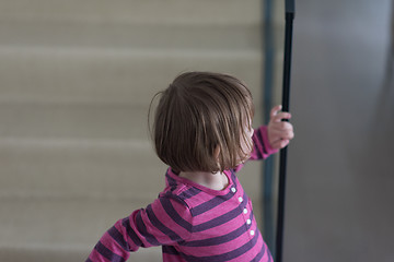 Image showing little cute girl enjoying on the stairs