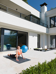 Image showing woman doing morning yoga exercises