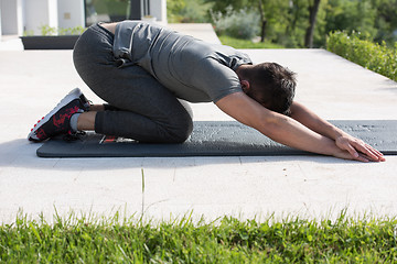 Image showing man doing morning yoga exercises