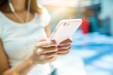 Image showing Woman using cellphone