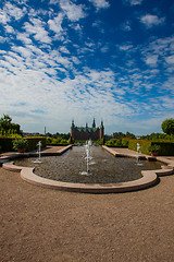 Image showing A fountain in the beautiful parkland around the great castle Fre