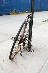 Image showing Abandoned broken and rusty bicycle 