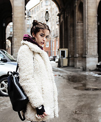 Image showing young pretty stylish teenage girl outside on city street fancy f