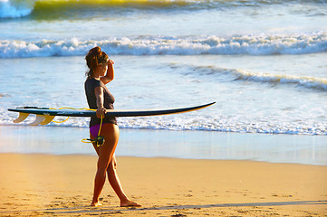 Image showing Surf girl on the beach