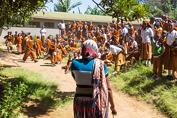 Image showing Children in uniforms playing in the cortyard of primary school in rural area near Arusha, Tanzania, Africa.