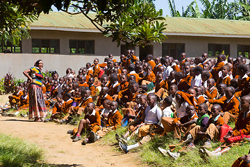 Image showing Children in uniforms playing in the cortyard of primary school in rural area near Arusha, Tanzania, Africa.