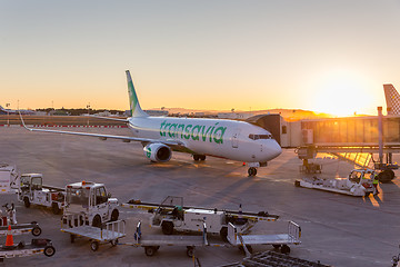 Image showing Transavia Jet commercial airplane on Valencia airport at sunset.