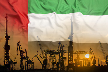 Image showing Industrial concept with United Arab Emirates flag at sunset