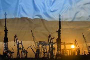 Image showing Industrial concept with Estonia flag at sunset