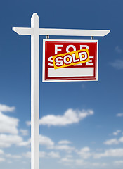 Image showing Right Facing Sold For Sale Real Estate Sign on a Blue Sky with C