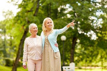 Image showing daughter with senior mother at park