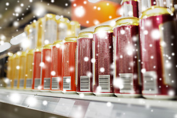 Image showing close up of beer or cider cans at liquor store