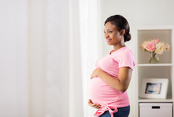 Image showing happy pregnant woman with big belly at home