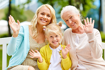 Image showing woman with daughter and senior mother at park