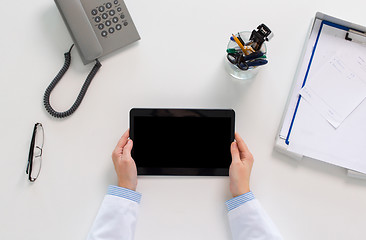 Image showing doctor hands with tablet pc at clinic