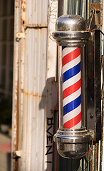 Image showing Barber Pole Business Advertisement Downtown