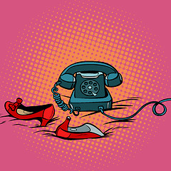 Image showing retro phone and womens red shoes
