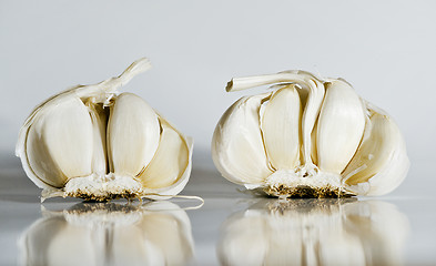 Image showing Two broken heads of garlic