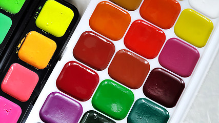 Image showing Bright colorful watercolor paints