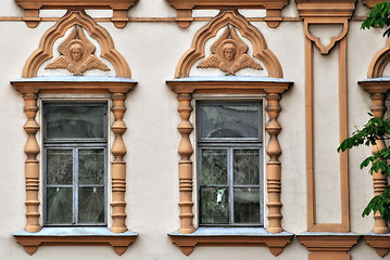 Image showing Two Windows with moldings.