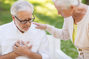 Image showing close up of senior man with heartache at park