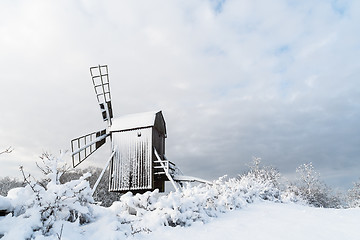 Image showing Old windmill in winter season