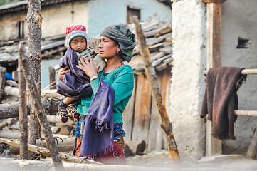 Image showing Woman holding child in Nepal