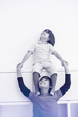 Image showing young boys posing line up piggyback