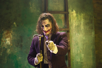 Image showing Bloody Halloween theme: crazy joker face