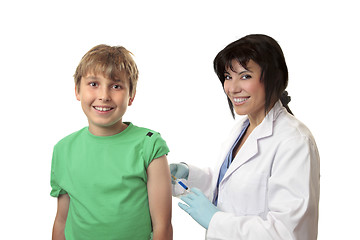 Image showing Brave boy receives a vaccination