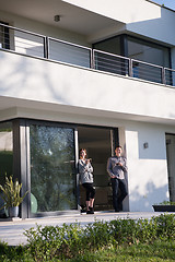 Image showing couple enjoying on the door of their luxury home villa