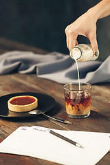 Image showing The cake on wooden table