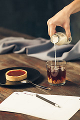 Image showing The cake on wooden table