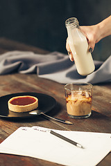 Image showing The cake on wooden table