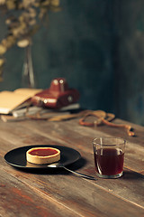 Image showing Opened craft paper envelope , autumn leaves and coffee on wooden table