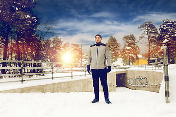 Image showing sports man in winter outdoors