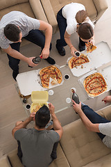 Image showing Pizza time a group of people